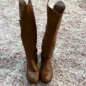 Tan knee high riding boots
